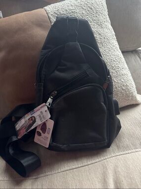 Compact Black Men's Sling Bag with USB Charging Port